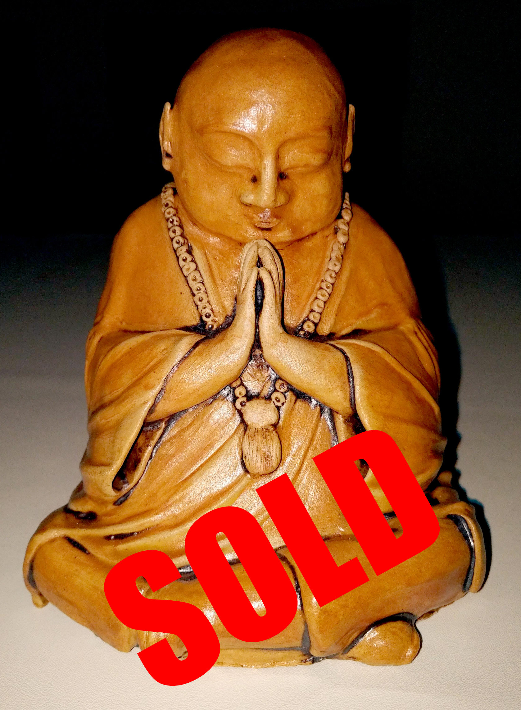 Greenware just off the wheel, staying damp under plastic until I am ready to trim it.